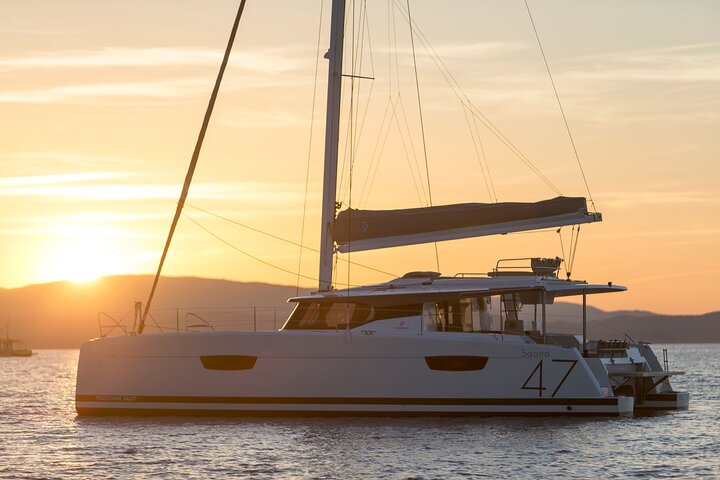 Mykonos: Brand-New Catamaran Cruise with Meal, Drinks & Transport