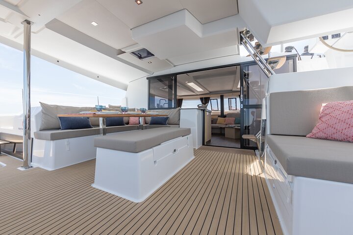 Mykonos: Brand-New Catamaran Cruise with Meal, Drinks & Transport