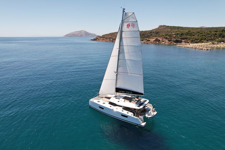 Mykonos: Brand-New Catamaran Cruise with Meal, Drinks & Transport