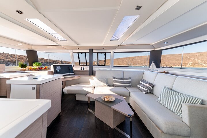 Mykonos: Brand-New Catamaran Cruise with Meal, Drinks & Transport