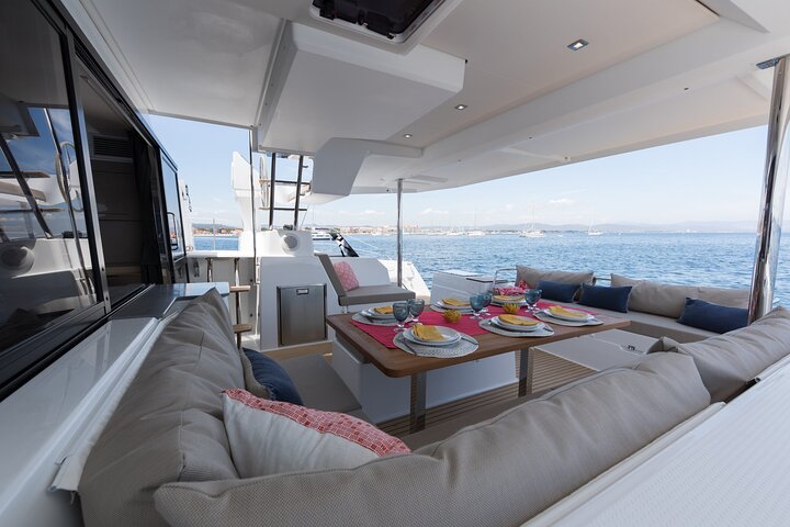 Mykonos: Brand-New Catamaran Cruise with Meal, Drinks & Transport