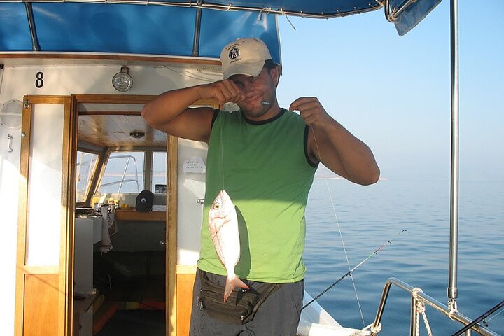 Taxi boat Kormat-5 hour half day tour from Punat