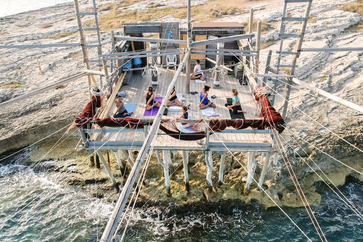 Yoga on a Trabucco - 
Suspended over the sea