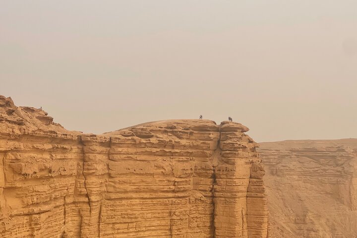 Edge of the World with 4x4 vehicle, camels and stargazing