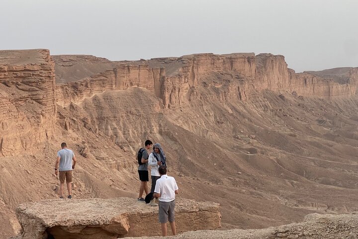 Edge of the World with 4x4 vehicle, camels and stargazing