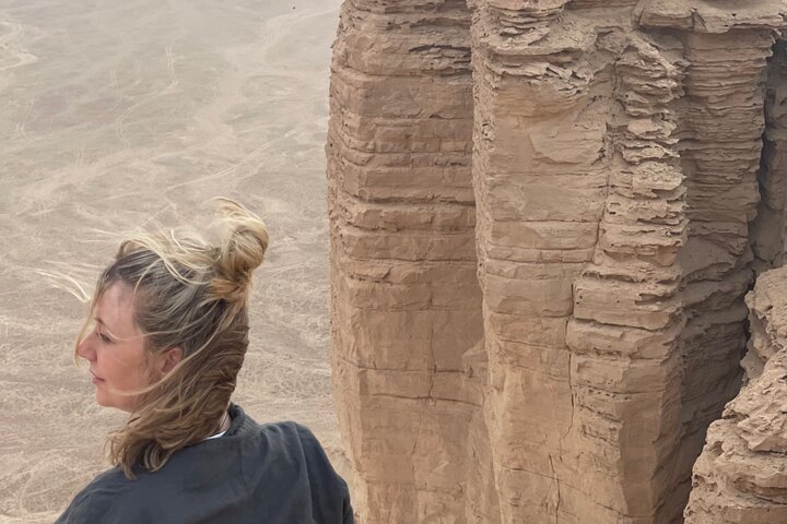 Edge of the World with 4x4 vehicle, camels and stargazing