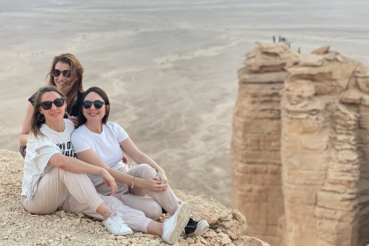 Edge of the World with 4x4 vehicle, camels and stargazing