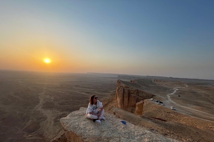 Edge of the World with 4x4 vehicle, camels and stargazing