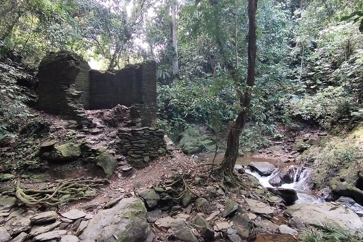 Hiking through Falan's ruins, ecotourism, river and canopy.