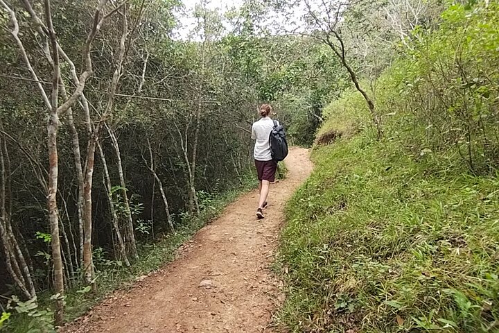 Natural adventure with waterfalls, trails and sunny day