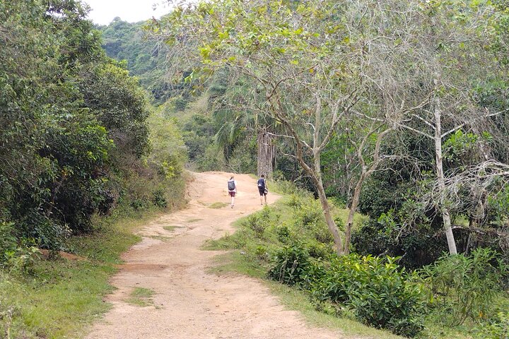 Natural adventure with waterfalls, trails and sunny day