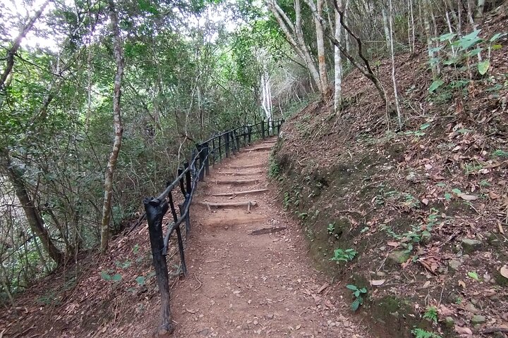 Natural adventure with waterfalls, trails and sunny day