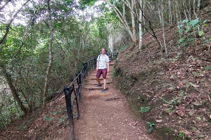 Natural adventure with waterfalls, trails and sunny day