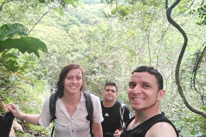 Natural adventure with waterfalls, trails and sunny day