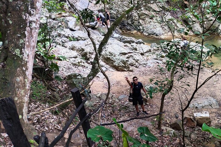 Natural adventure with waterfalls, trails and sunny day