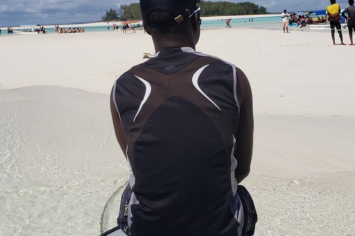 Mnemba Island snorkeling and Swimming with Dolphin