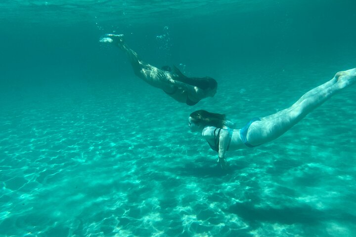 Boat Tour at Devil's Saddle: 4 Swim Stops, Snorkeling & Prosecco