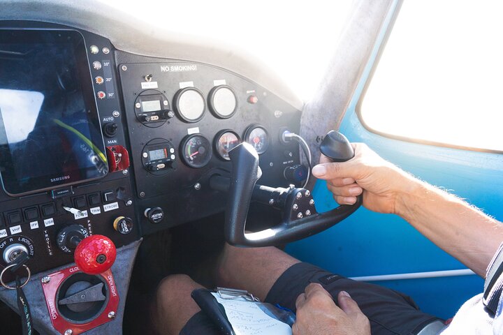Private 30-minute flight downwind of Huahine