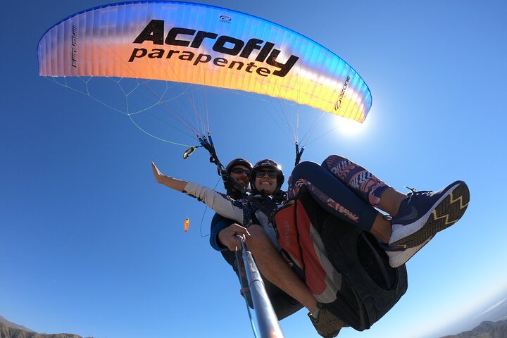 Paragliding free flight experience over the pre-range