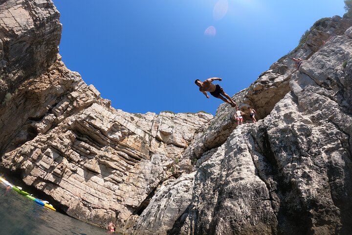 Pula: Sea Cave Kayak Tour with Snorkeling & Cliff Jumping