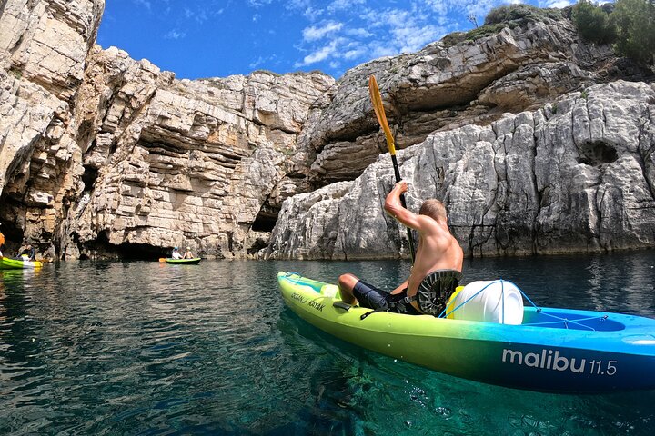 Pula: Sea Cave Kayak Tour with Snorkeling & Cliff Jumping