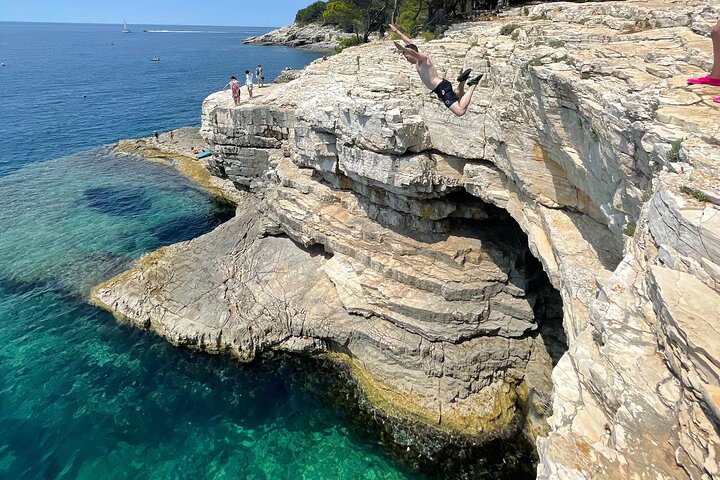 Pula: Sea Cave Kayak Tour with Snorkeling & Cliff Jumping