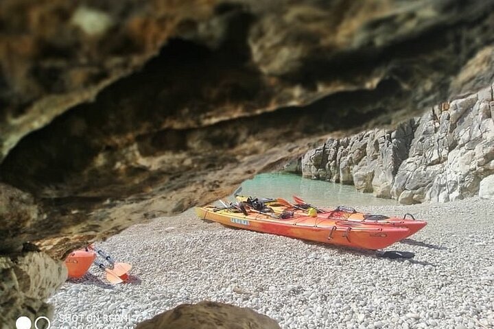 Kayak Trip to Hidden blue Cave, with lunch & fruits.