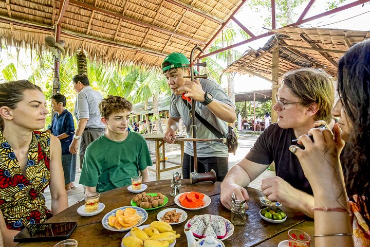 Small-Group Mekong Delta Day Trip: Boat Ride, Cottages & Pagoda