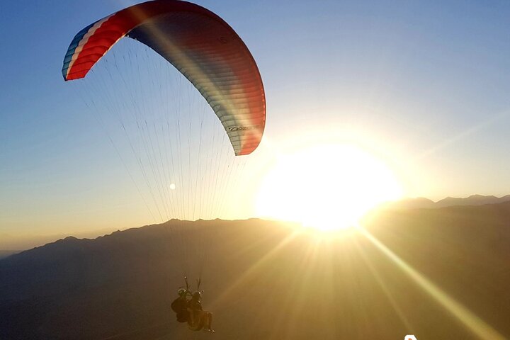 Paragliding free flight experience over the pre-range