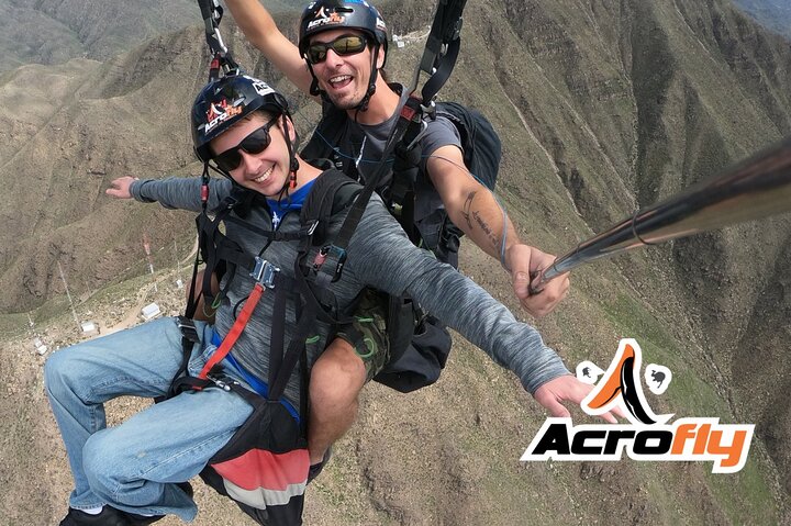 Paragliding free flight experience over the pre-range