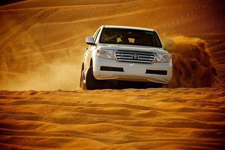 Doha:ATV,Quad or Buggy Dune Bashing,CamelRide & Sandboarding
