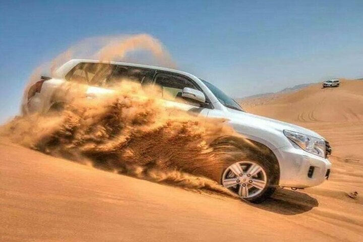 Doha:ATV,Quad or Buggy Dune Bashing,CamelRide & Sandboarding