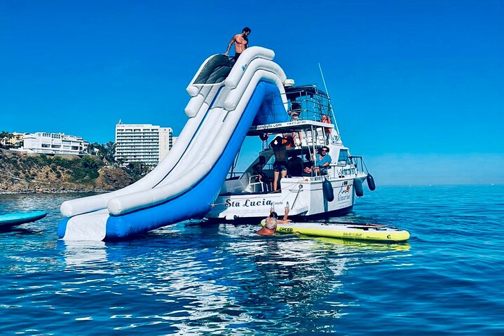 Boat Tour with Snorkeling, Slide, Lunch and Pick Up