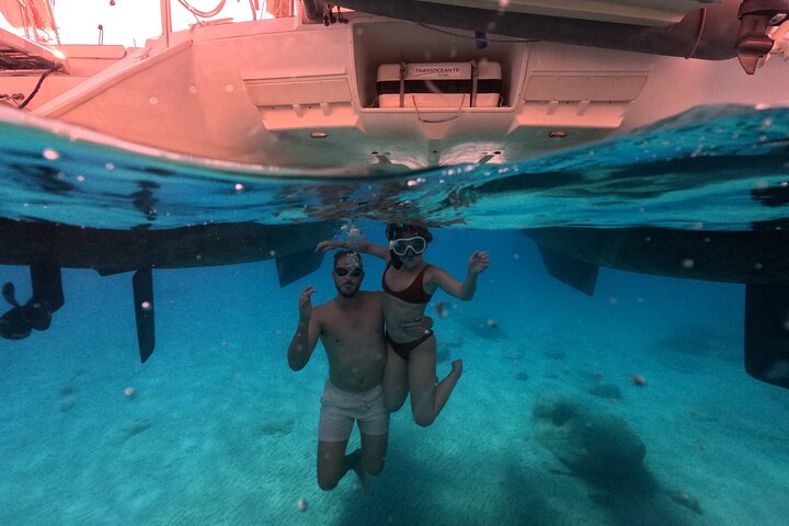 Best of Milos and Poliegos Catamaran snorkelling Cruise with BBQ