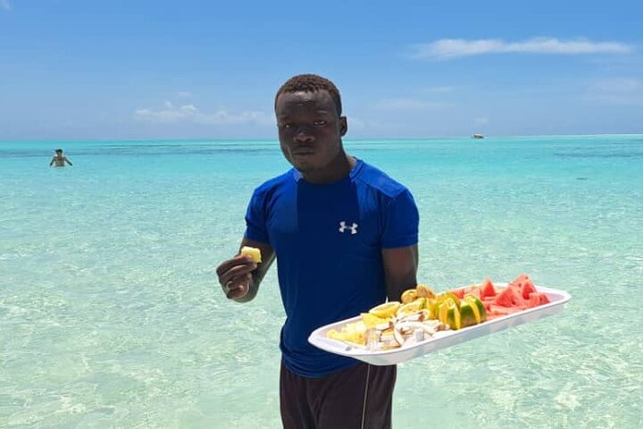 Mnemba Island snorkeling and Swimming with Dolphin