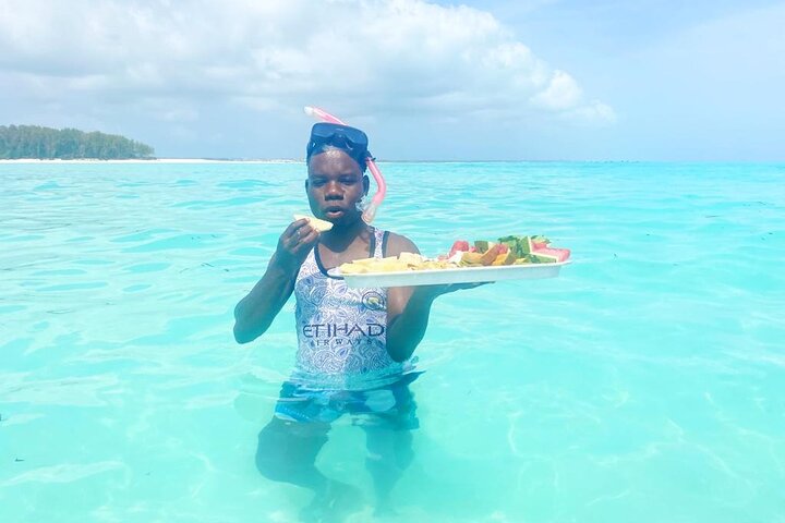 Mnemba Island snorkeling and Swimming with Dolphin