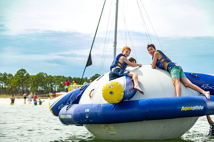 Shell Island Inflatable Adventure Park & Dolphin Sightseeing Tour