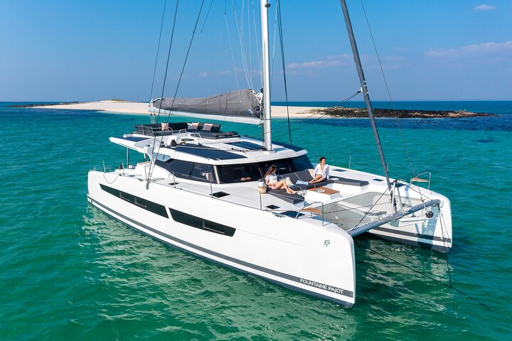 Mykonos: Brand-New Catamaran Cruise with Meal, Drinks & Transport
