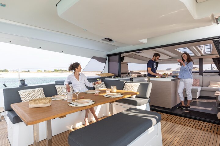 Mykonos: Brand-New Catamaran Cruise with Meal, Drinks & Transport