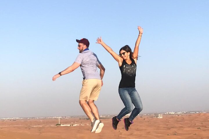 Dubai Morning 4 Hrs Safari Sharing Jeep Sand Boarding &Camle Ride