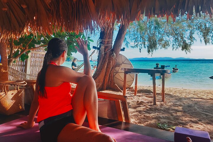Sunrise yoga class overlooking the beach, the sea & sunrise .