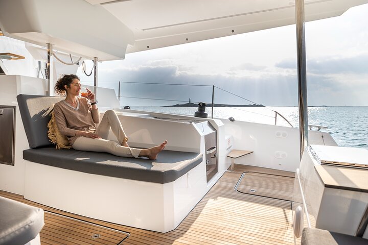Mykonos: Brand-New Catamaran Cruise with Meal, Drinks & Transport