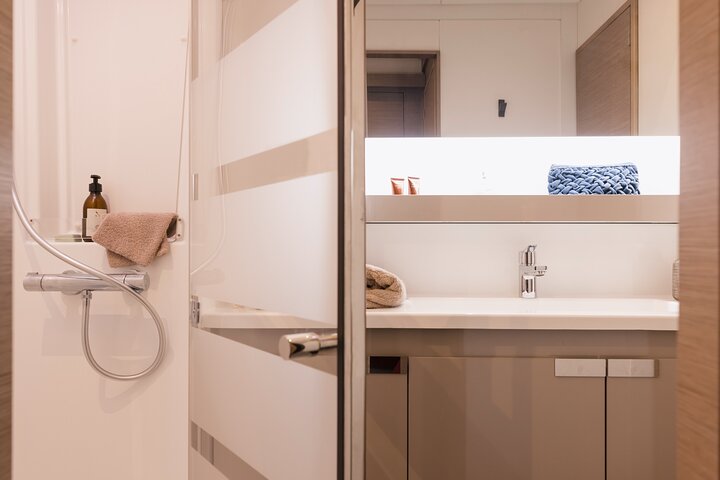 Mykonos: Brand-New Catamaran Cruise with Meal, Drinks & Transport