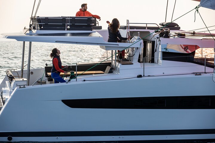 Mykonos: Brand-New Catamaran Cruise with Meal, Drinks & Transport