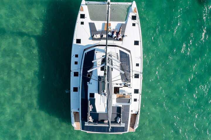 Mykonos: Brand-New Catamaran Cruise with Meal, Drinks & Transport