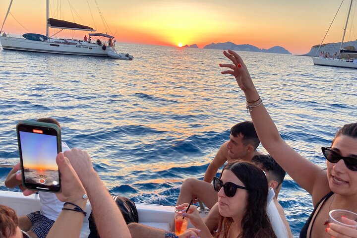 Aperitif on a boat at sunset