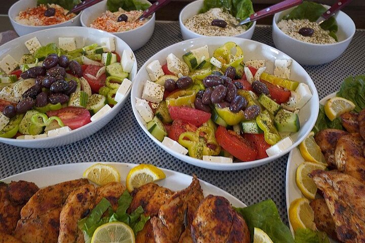 Santorini Catamaran Cruise with Swim-Stops, Greek Meal and Sunset