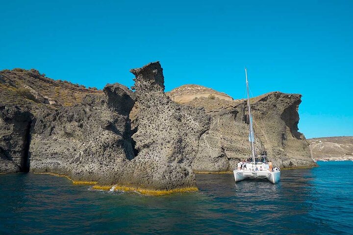 Santorini Catamaran Cruise with Swim-Stops, Greek Meal and Sunset