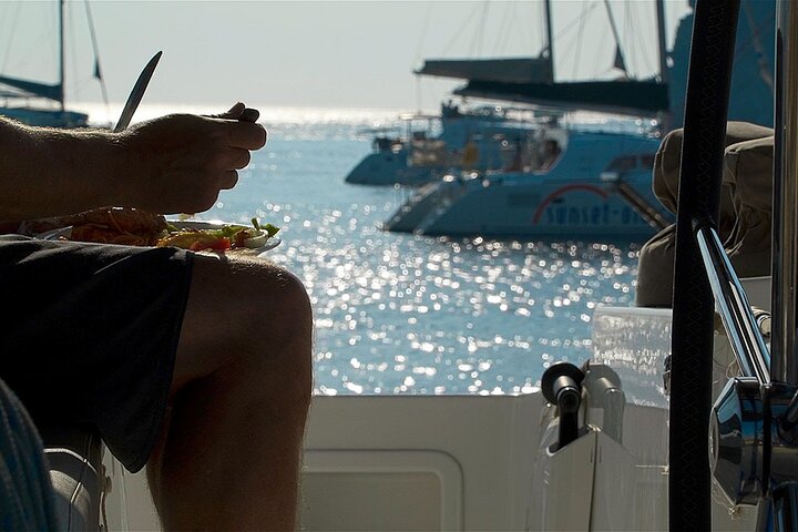 Santorini Catamaran Cruise with Swim-Stops, Greek Meal and Sunset