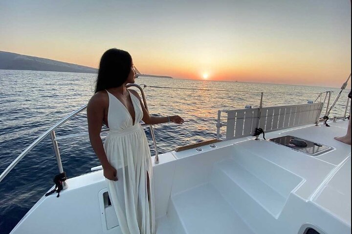 Santorini Catamaran Cruise with Swim-Stops, Greek Meal and Sunset